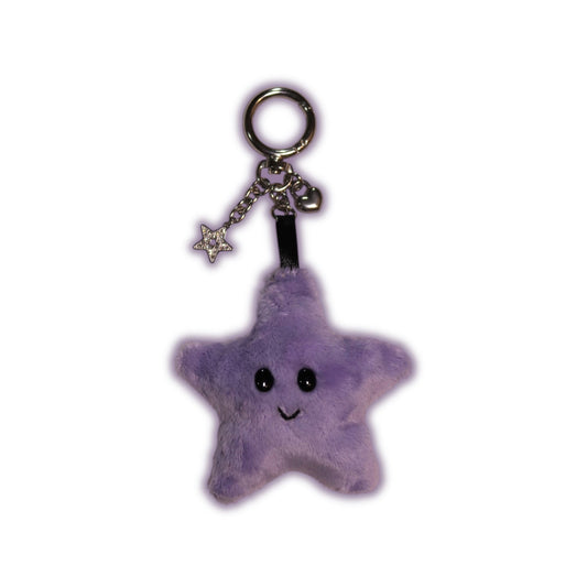 Purple star-shaped keychain with a smiling face on a white background