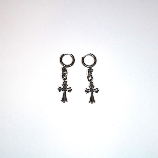 Pair of stainless steel cross drop earrings on a white background