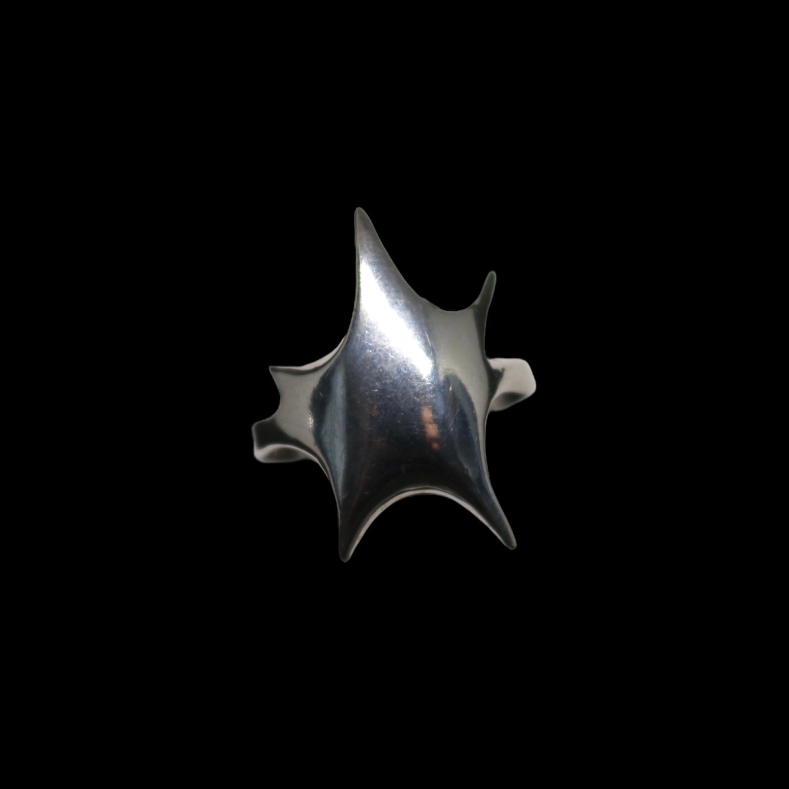 STARBURST RING black background